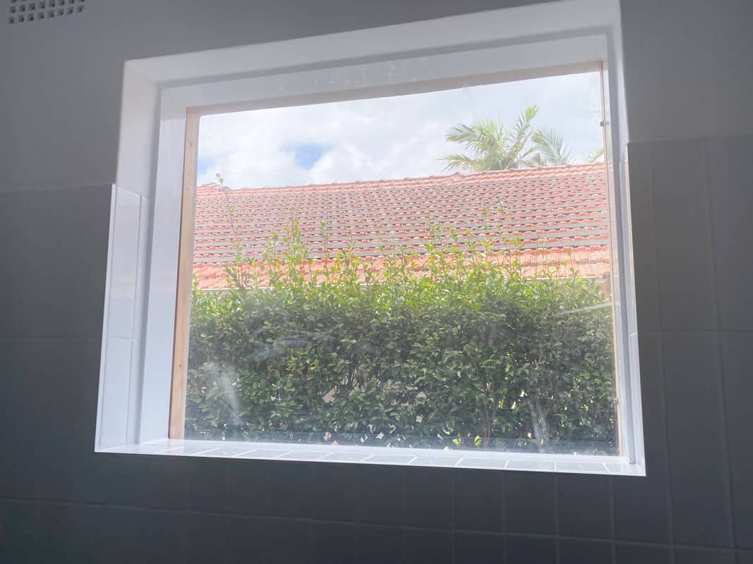 What-does-poor-quality-bathroom-renovation-look-like-window-not-installed-correctly