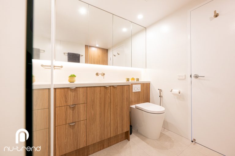 Bathroom renovation with laundry in North Sydney timber vanity