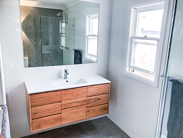 Small bathroom renovation in Alexandria with a custom made timber vanity from Eclipse Handcrafted Furniture with new sink and taps